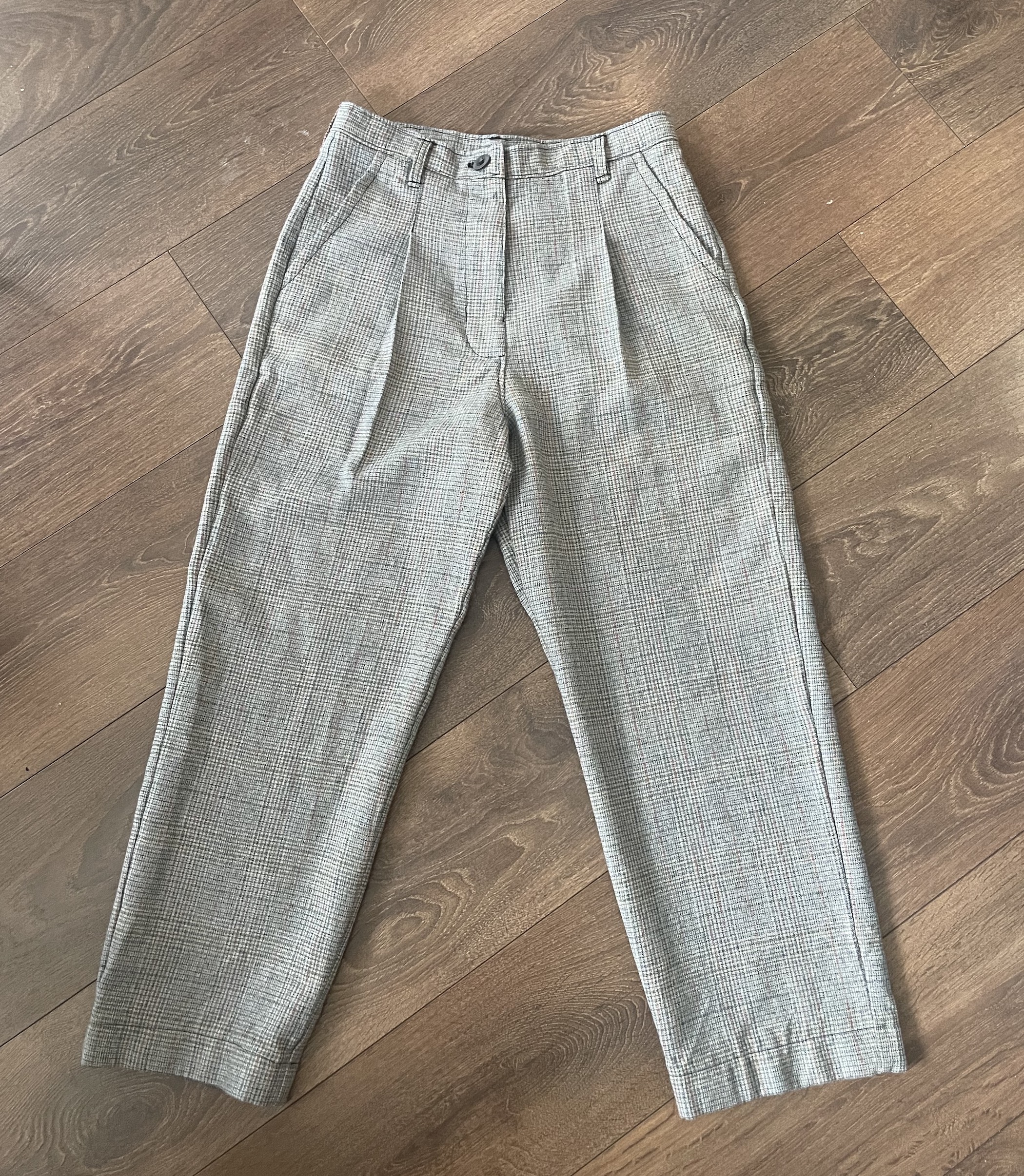 trousers laid out on floor